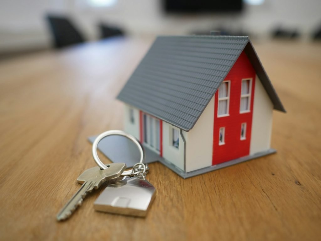 House model with keys — property document drafting